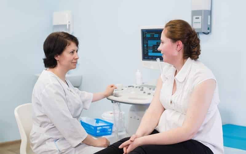 Men praying together in therapy